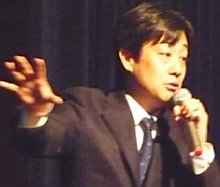 写真：講演する田渕さん